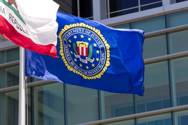 FBI Flag flying in front of the FBI San Diego Field Office at 10385 Vista Sorrento Parkway, San Diego, CA. (John Gibbins / The San Diego Union-Tribune)