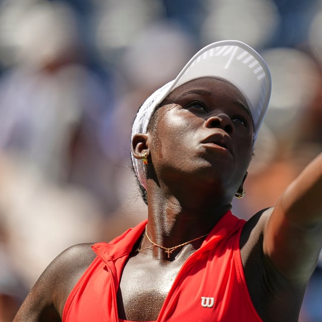 Victoria Mboko, of Canada, serves to Barbora Krejcikova, of the Czech Republic, during the first round of the US Open tennis championships, Monday, Aug. 25, 2025, in New York. (AP Photo/Kirsty Wigglesworth)