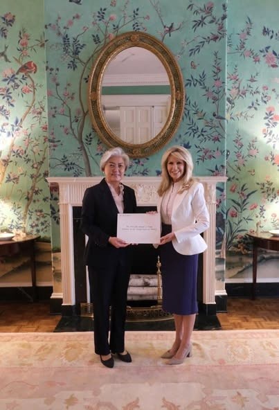 South Korea's new Ambassador to the United States Kang Kyung-wha (L) presents a copy of her credentials to Monica Crowley, the chief of protocol of the U.S., in Washington on Oct. 6, 2025, in this photo captured from the Facebook account of the Korean Embassy in Washington. (PHOTO NOT FOR SALE) (Yonhap)
