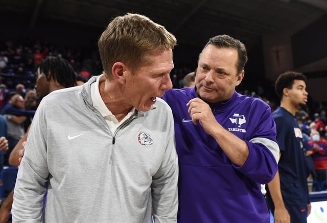 Nov 29, 2021; Spokane, Washington, USA; Gonzaga Bulldogs head coach Mark Few, left, talks with Tarleton State Texans head coach Billy Gillispie (right) after a game at McCarthey Athletic Center. Gonzaga won 64-55. Mandatory Credit: James Snook-USA TODAY Sports/ File Photo
