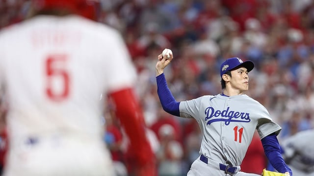 Oct 6, 2025; Philadelphia, Pennsylvania, USA; Los Angeles Dodgers pitcher Roki Sasaki (11) throws a pitch against the Philadelphia Phillies in the ninth inning during game two of the NLDS round for the 2025 MLB playoffs at Citizens Bank Park. Mandatory Credit: Bill Streicher-Imagn Images