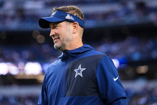 ARLINGTON, TEXAS - SEPTEMBER 28: Dallas Cowboys head coach Brian Schottenheimer looks on from the field during warmups prior to an NFL football game against the Green Bay Packers at AT&T Field on September 28, 2025 in Arlington, Texas. (Photo by Cooper Neill/Getty Images)