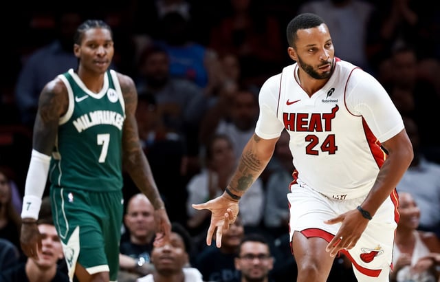 Heat forward Norman Powell reacts to a 3-pointer against the Milwaukee Bucks during the first half at Kaseya Center on October 06, 2025 in Miami, Florida. (Carmen Mandato/Getty Images)