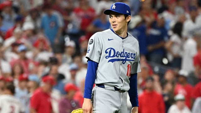 Oct 6, 2025; Philadelphia, Pennsylvania, USA; Los Angeles Dodgers pitcher Roki Sasaki (11) reacts to the final out of game two of the NLDS round against the Philadelphia Phillies for the 2025 MLB playoffs at Citizens Bank Park. Mandatory Credit: Eric Hartline-Imagn Images