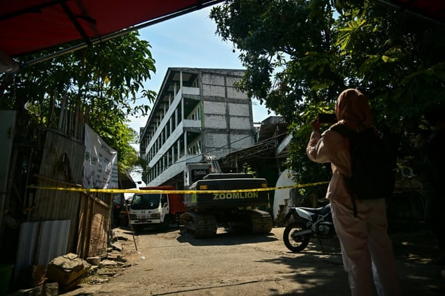 Over a week after an Indonesia school collapse, the death toll has hit 67