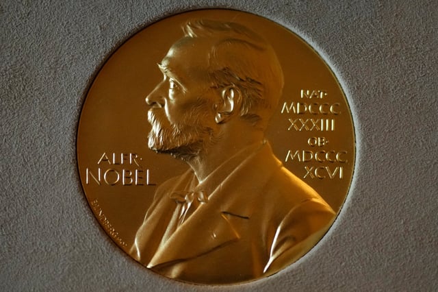 FILE - A Nobel Prize medal is displayed before a ceremony at the Swedish Ambassador's Residence in London, Monday, Dec. 6, 2021. (AP Photo/Matt Dunham, File)