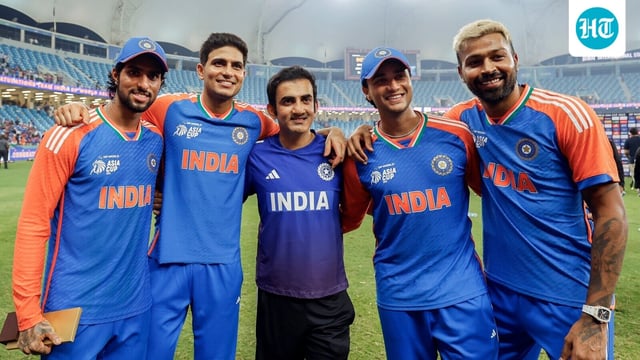 Indian Cricket Team head coach Gautam Gambhir poses the players after Asia Cup win