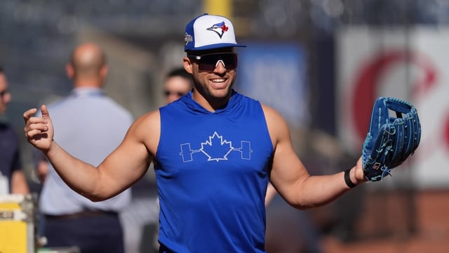 Toronto Blue Jays slugger George Springer walks onto the field for batting practice at Yankee Stadium in New York on Monday. The Jays and Yankees will play Game 3 of their divisional series on Tuesday. The Jays hold a 2-0 lead and have the chance to sweep the best-of-five playoff series. 