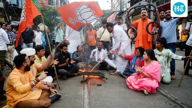 BJP activists protest against the attack on MP Khagen Murmu and MLA Shankar Ghosh during their visit to the flood-hit Doars Nagrakata area in Kolkata.
