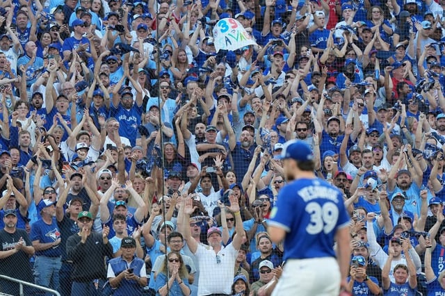 Fans cheer with a standing ovation for Toronto Blue Jays pitcher Trey Yesavage (39) after he was pulled from the mound during sixth inning MLB American League Division Series baseball action against the New York Yankees, in Toronto, Sunday, Oct. 5, 2025. THE CANADIAN PRESS/Frank Gunn