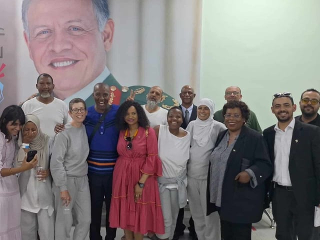 The detainees and officials safe on Jordan. Picture: X / @Chrispin_JPhiri