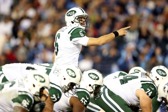 Sanchez calling a play against the Titans during his playing days.