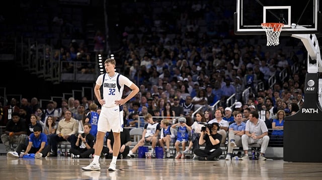 Oct 6, 2025; Fort Worth, Texas, USA; Dallas Mavericks forward Cooper Flagg (32) looks on during the second quarter against the Oklahoma City Thunder at Dickie's Arena. Mandatory Credit: Jerome Miron-Imagn Images