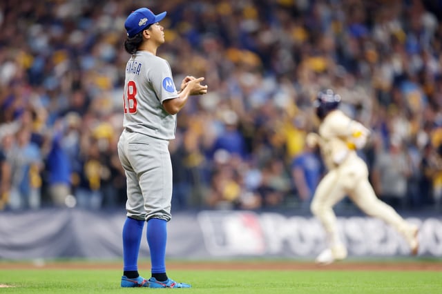 MILWAUKEE, WISCONSIN - OCTOBER 06: Shota Imanaga #18 of the Chicago Cubs reacts after giving up a home run to William Contreras #24 of the Milwaukee Brewers during the third inning in game two of the National League Division Series at American Family Field on October 06, 2025 in Milwaukee, Wisconsin. (Photo by Michael Reaves/Getty Images)
