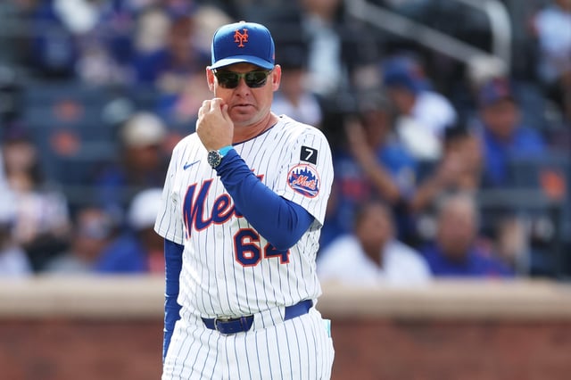 NEW YORK, NEW YORK - SEPTEMBER 21: Manager Carlos Mendoza #64 of the New York Mets returns to the dugout after Mark Vientos is ejected in the sixth inning of a game against the Washington Nationals at Citi Field on September 21, 2025 in New York City. (Photo by Heather Khalifa/Getty Images)