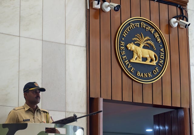 A policeman stands guard at the entrance of the Reserve Bank of India (RBI) headquarters in Mumbai, India, April 4, 2019. REUTERS/Francis Mascarenhas