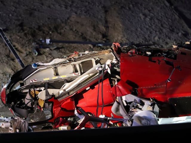 A medical helicopter is shown after it crashed on Highway 50 Monday, Oct. 6, 2025, in Sacramento, Calif. (AP Photo/Scott Marshall)