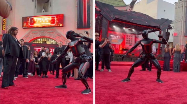 Tesla Optimus robot 'tries to start a fight' at Tron Ares premiere.