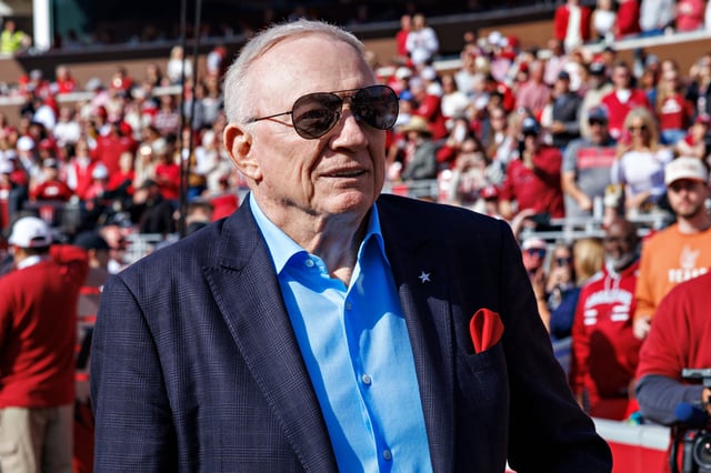 Dallas Cowboys owner and Razorback Alumni Jerry Jones on the field during a game between the Texas Longhorns and the Arkansas Razorbacks at Donald W. Reynolds Razorback Stadium on November 16, 2024 in Fayetteville, Arkansas.