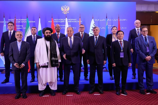 Afghanistan's Foreign Minister Amir Khan Muttaqi, second left in the first row, Russian Foreign Minister Sergey Lavrov, center in the first row, Russian presidential envoy to Afghanistan Zamir Kabulov, third right in the first row, and other representatives pose for a photo prior to their talks on the sidelines of the Moscow format consultations on Afghanistan in Moscow, Russia, Tuesday, Oct. 7, 2025. (AP Photo/Alexander Zemlianichenko)