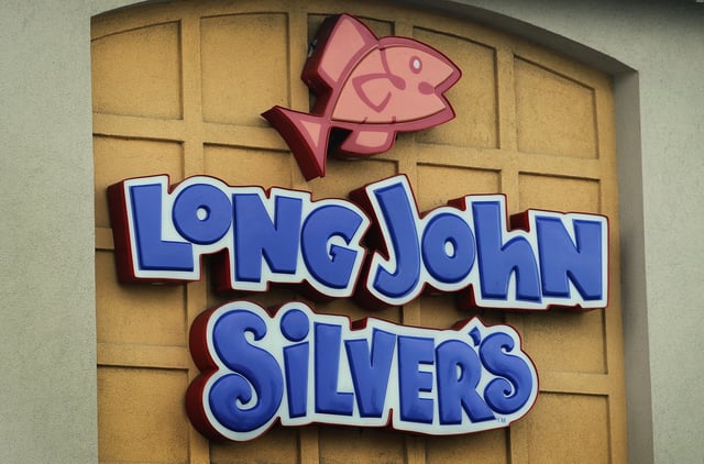 OAK LAWN, IL - SEPTEMBER 22:  A sign hangs above a Yum Brands Long John Silver's restaurant on September 22, 2011 in Oak Lawn, Illinois. Yum Brands Inc., which also owns KFC, Pizza Hut and Taco Bell, has agreed to sell its Long John Silver’s restaurants to LJS Partners LLC and the A&W All-American Food chain to A Great American Brand LLC.  (Photo by Scott Olson/Getty Images)