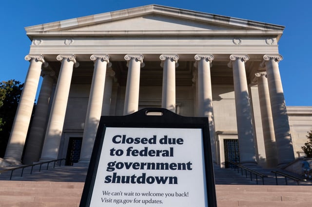 A sign that reads "Closed due to federal government shutdown," is seen outside of the National Gallery of Art on the 6th day of the government shutdown, in Washington, Monday, Oct. 6, 2025. (AP Photo/Jose Luis Magana)