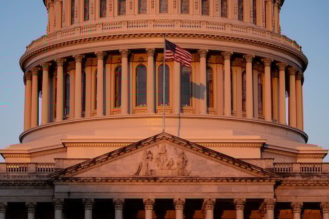 The Capitol is illuminated at dawn in Washington, Monday, Oct. 6, 2025. (AP Photo/J. Scott Applewhite)