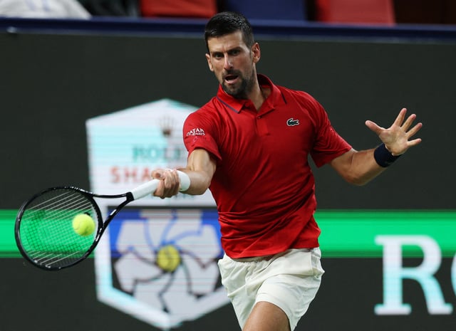 Tennis - ATP Masters 1000 - Shanghai Masters - Qizhong Forest Sports City Arena, Shanghai, China - October 7, 2025 Serbia's Novak Djokovic in action during his round of 16 match against Spain's Jaume Munar REUTERS/Go Nakamura