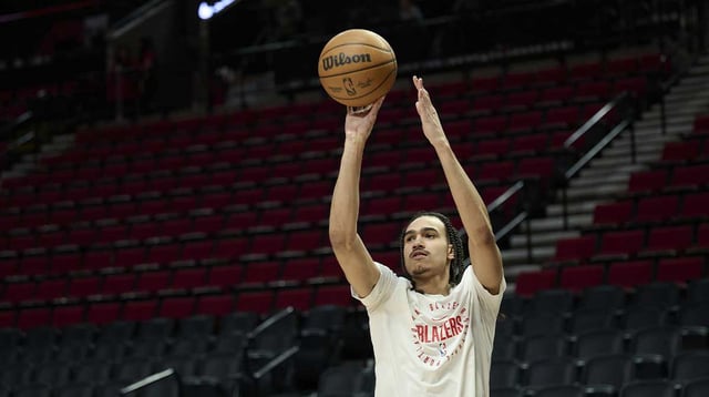 Mar 21, 2025; Portland, Oregon, USA; Portland Trail Blazers guard Dalano Banton (5) warms up before a game against the Denver Nuggets at Moda Center. Mandatory Credit: Troy Wayrynen-Imagn Images