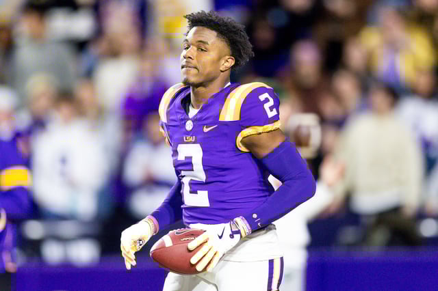 Nov 30, 2024; Baton Rouge, Louisiana, USA;  LSU Tigers wide receiver Kyren Lacy (2) hugs head coach Brian Kelly as seniors are being honored during the beginning of the first quarter at Tiger Stadium. Mandatory Credit: Stephen Lew-Imagn Images
