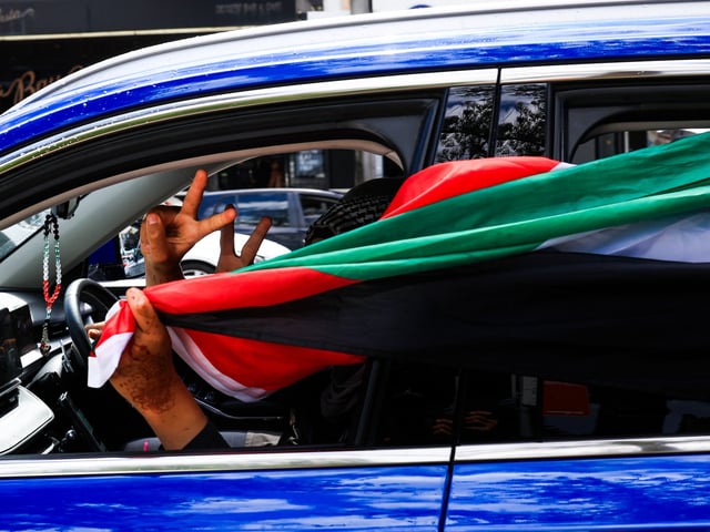SYDNEY, AUSTRALIA - NOVEMBER 26: People drive to Sans Souci Beach after a 'Ride for Palestine' rally from Bankstown on November 26, 2023 in Sydney, Australia. Urged by the U.S., Israel and Hamas agreed to a temporary halt in fighting that will see some 150 Palestinian prisoners swapped for 50 Israeli hostages, and allow urgently needed aid to be delivered to the Gaza Strip. (Photo by Jenny Evans/Getty Images)