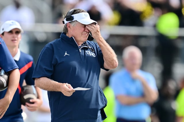 ORLANDO, FLORIDA - SEPTEMBER 20: Head coach Bill Belichick of the North Carolina Tar Heels reacts in the first half of a game against the UCF Knights at FBC Mortgage Stadium on September 20, 2025 in Orlando, Florida. (Photo by Julio Aguilar/Getty Images)
