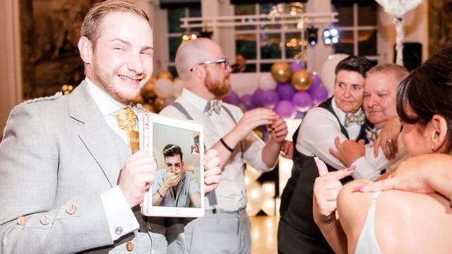 Ross Evans during the wedding when Drew Hoffman was live-streamed from his hotel in LA