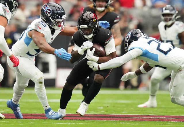 Arizona Cardinals running back Michael Carter didn't find a whole lot of running room against the Tennessee Titans defense, but he did have 18 carries and five receptions in his first week as a starter.