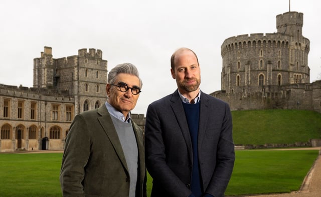 Prince William is seen with Eugene Levy in The Reluctant Traveler.