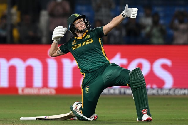 Tazmin Brits of South Africa celebrates her century during the ICC Women's Cricket World Cup India 2025 match against New Zealand at Holkar Cricket Stadium on 6 October 2025 in Indore, India. (Photo: Prakash Singh / Getty Images)