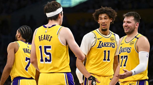 Apr 11, 2025; Los Angeles, California, USA; Los Angeles Lakers guard Luka Doncic (77) celebrates with center Jaxson Hayes (11), and guard Austin Reaves (15) after scoring against the Houston Rockets during the first half at Crypto.com Arena. Mandatory Credit: Jonathan Hui-Imagn Images