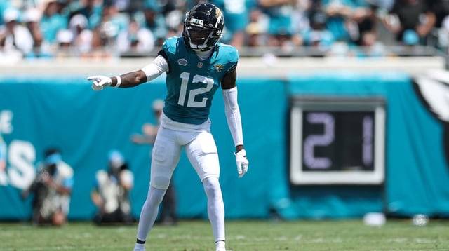 Sep 7, 2025; Jacksonville, Florida, USA; Jacksonville Jaguars wide receiver Travis Hunter (12) lines on the line of scrimmage prior to a play against the Carolina Panthers during the first half at EverBank Stadium.