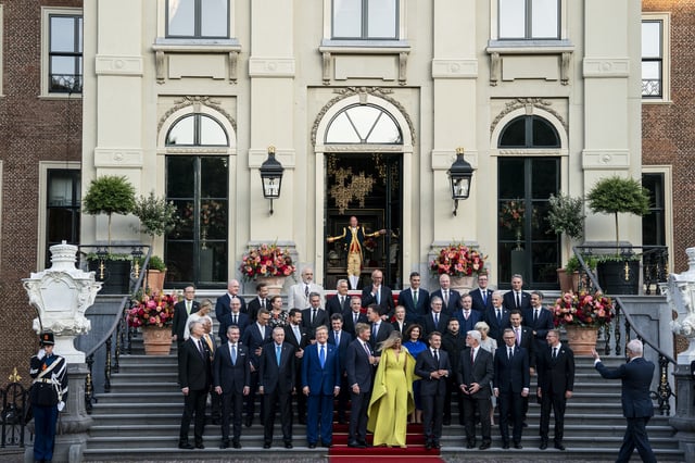 Queen Maxima wears a striking green jumpsuit at a 2025 NATO summit.