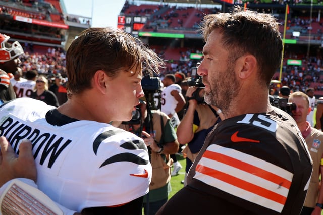 CLEVELAND, OHIO - SEPTEMBER 07: Joe Burrow #9 of the Cincinnati Bengals and Joe Flacco #15 of the Cleveland Browns embrace after the game during the game at Huntington Bank Field on September 07, 2025 in Cleveland, Ohio. (Photo by Gregory Shamus/Getty Images)