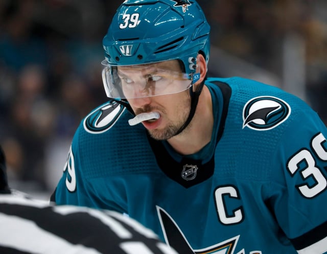 San Jose Sharks’ Logan Couture (39) waits for a face-off against the Pittsburgh Penguins in the third period at the SAP Center in San Jose, Calif., on Tuesday, Feb. 14, 2023. (Nhat V. Meyer/Bay Area News Group)