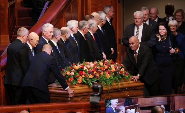 Apostles stand as the casket of President Russell M. Nelson of The Church of Jesus Christ of Latter-day Saints is brought in during funeral services at the Conference Center in Salt Lake City on Tuesday, Oct. 7, 2025.