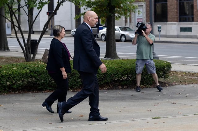 Antonietta Roy, left, leaves U.S. District Court in Bridgeport with attorney Craig Raabe on October 7, 2025. Credit: Shahrzad Rasekh / CT Mirror