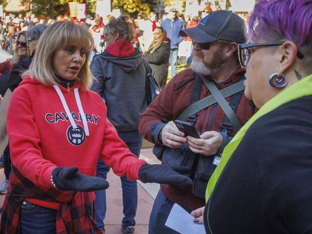 Calgary mayor Jyoti Gondek speaks with Calgary Public Teachers Local 38 President Stephani Clements at a rally in support of public education for World Teachers' Day at McDougall Centre in Calgary on Sunday.