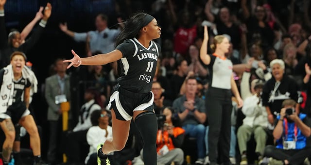 Oct 3, 2025; Las Vegas, Nevada, USA; Las Vegas Aces guard Dana Evans (11) gestures after scoring against the Phoenix Mercury during the second quarter of game one of the 2025 WNBA Finals at Michelob Ultra Arena. Mandatory Credit: Stephen R. Sylvanie-Imagn Images