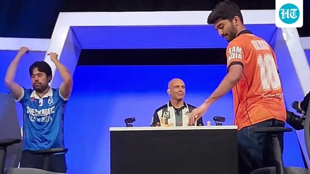 Hikaru Nakamura celebrates after beating D Gukesh.