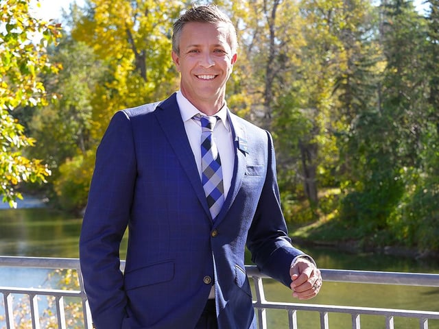  Mayoral candidate Jeff Davison poses for a photo as he speaks to media in Calgary on Tuesday, Oct. 7, 2025.