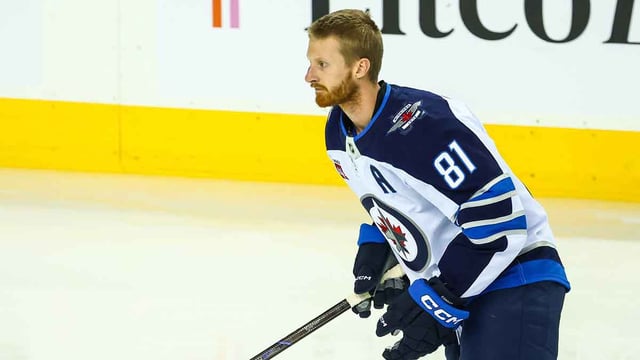 Oct 3, 2025; Calgary, Alberta, CAN; Winnipeg Jets left wing Kyle Connor (81) skates during the warmup period against the Calgary Flames at Scotiabank Saddledome. Mandatory Credit: Sergei Belski-Imagn Images