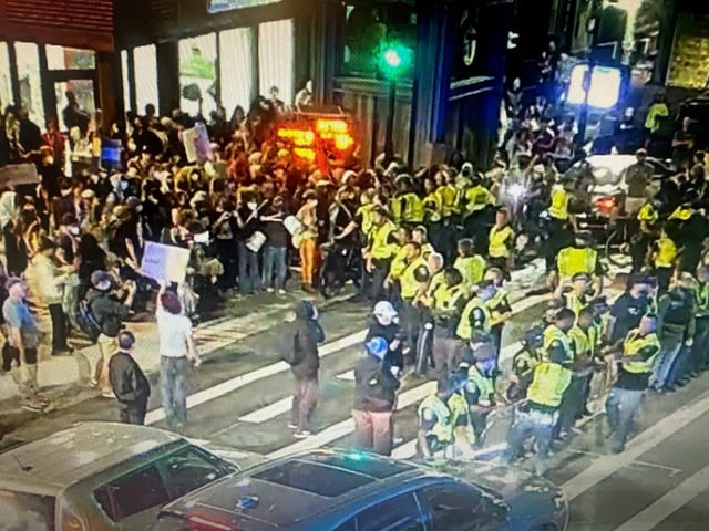 Boston police encounter a mob of protesters during a "Flood the Downtown" pro-Palestinian march from Boston Common Tuesday October 7, 2025. (Contributed photo)