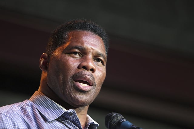 Herschel Walker attends a primary watch party at the Foundry restaurant in Athens, Ga., on May 23, 2022.